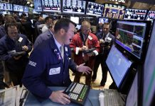 Diễn biến thị trường: Chứng khoán Mỹ dao động, giá dầu bật tăng do căng thẳng Mỹ–Iran